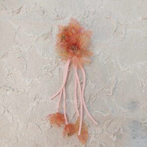 粉橘色亮絲仿真花飾品